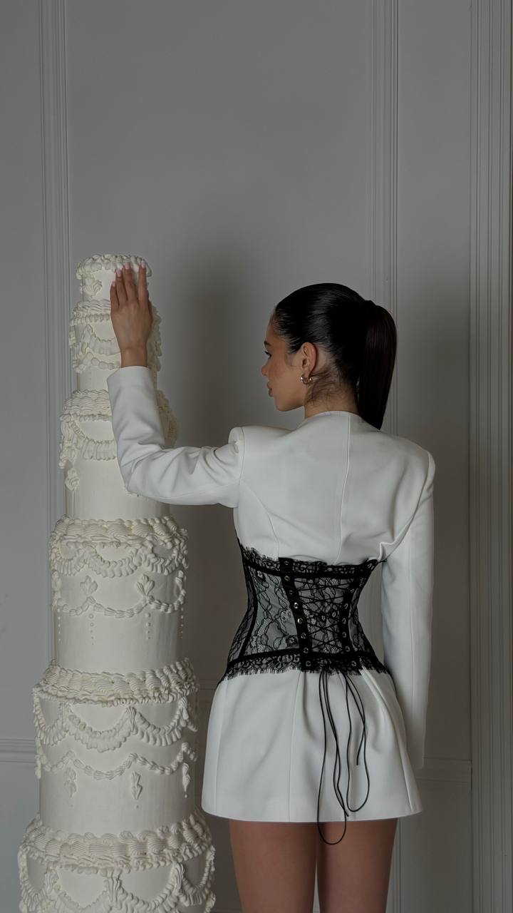 Dress with a corset silhouette and accent lace