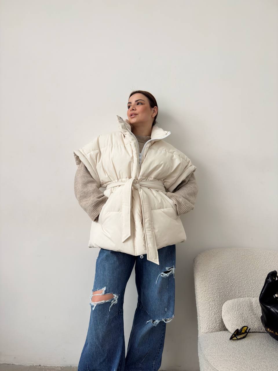 Oversized vest with a belt