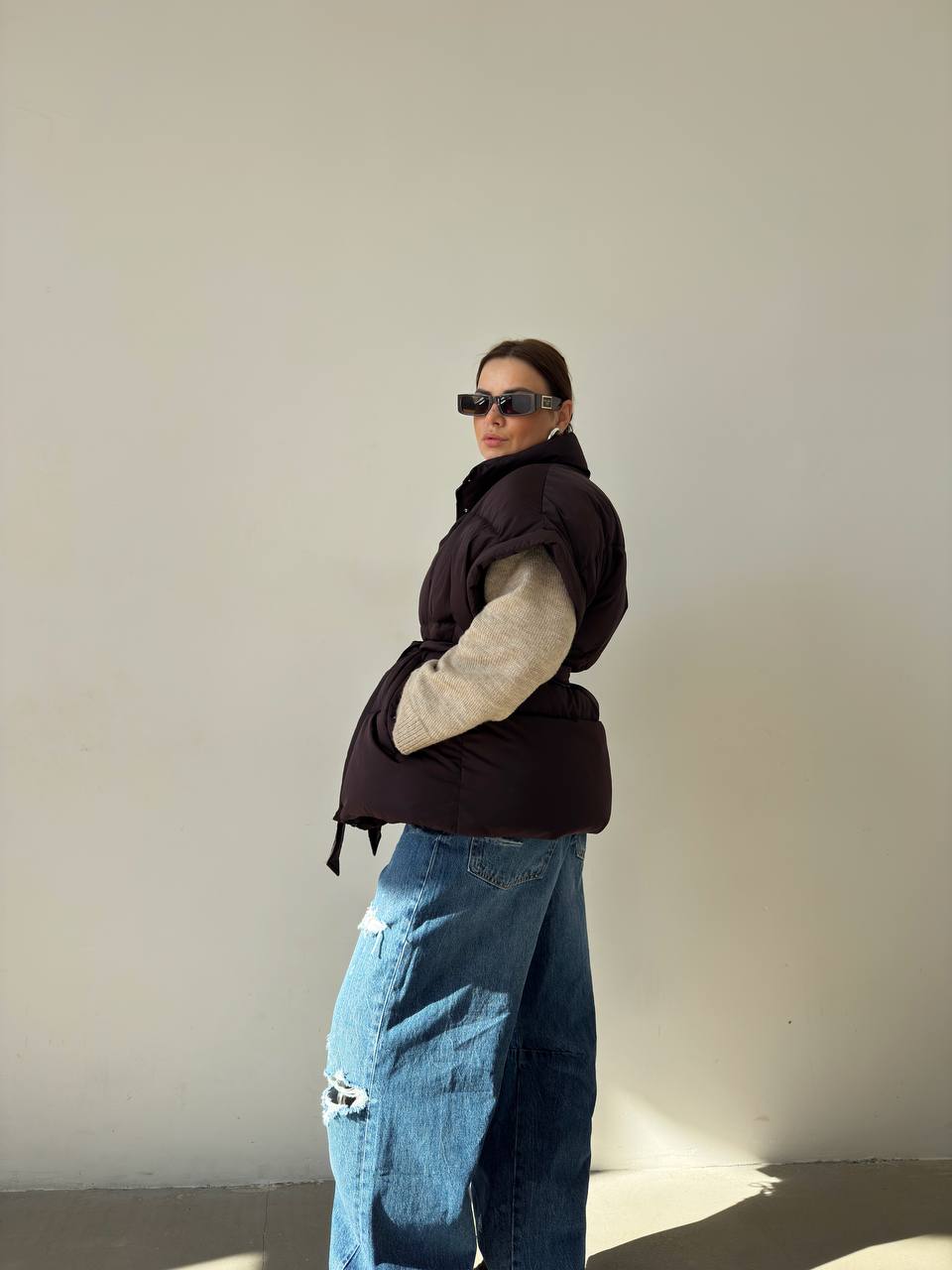 Oversized vest with a belt