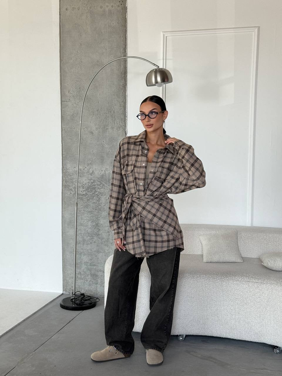 A bright checkered shirt with a matching scarf