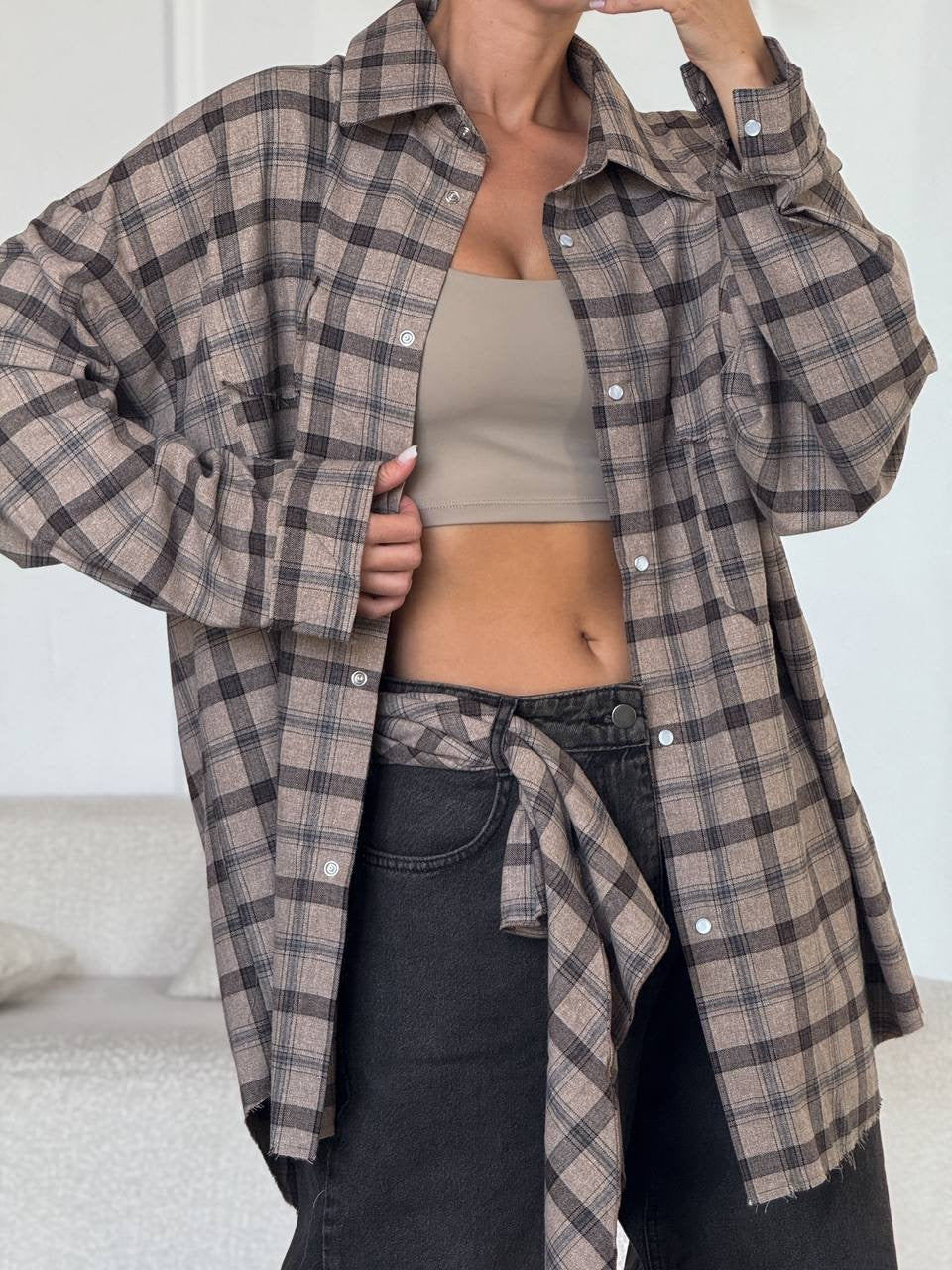 A bright checkered shirt with a matching scarf