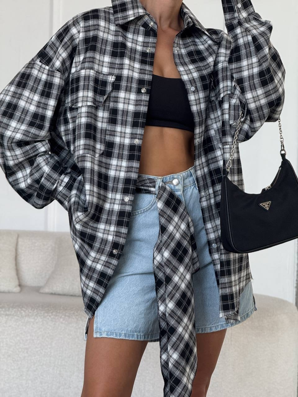 A bright checkered shirt with a matching scarf