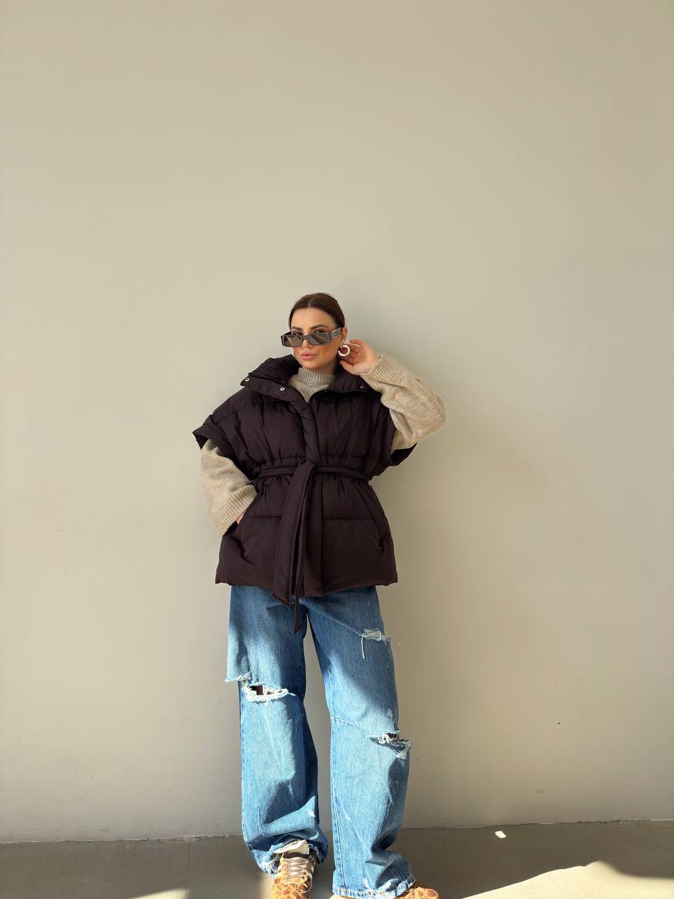 Oversized vest with a belt