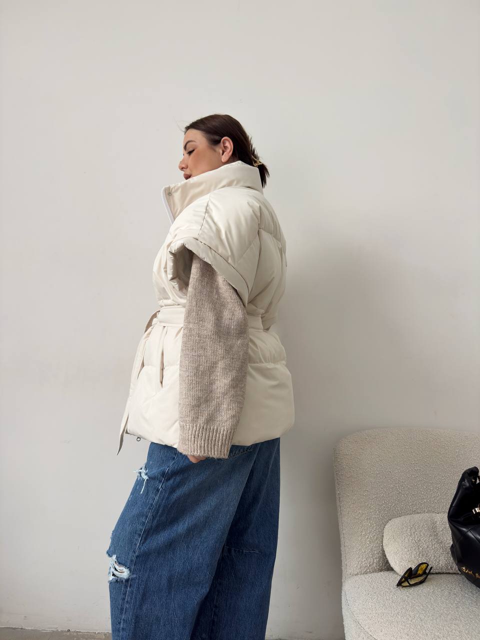 Oversized vest with a belt