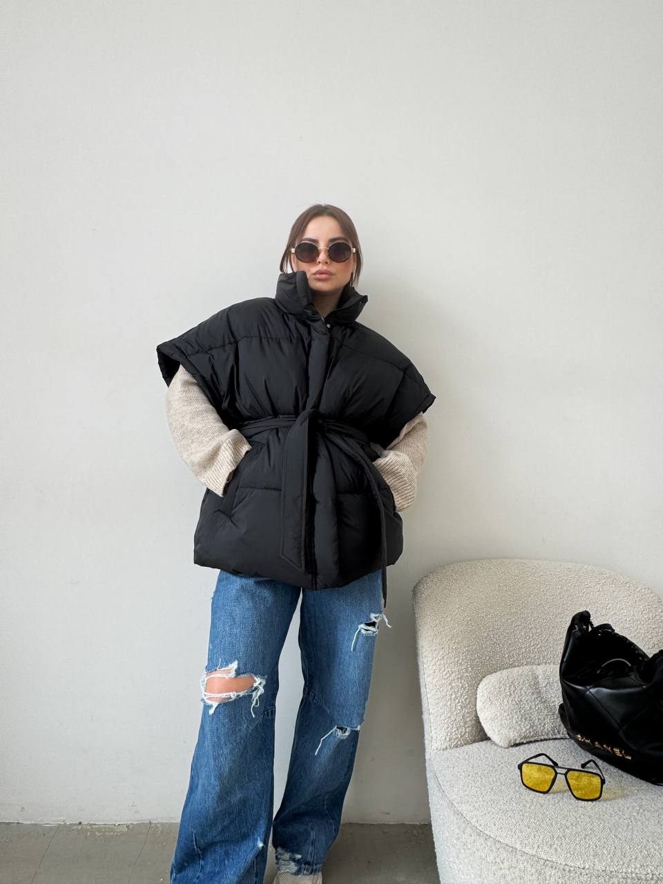 Oversized vest with a belt