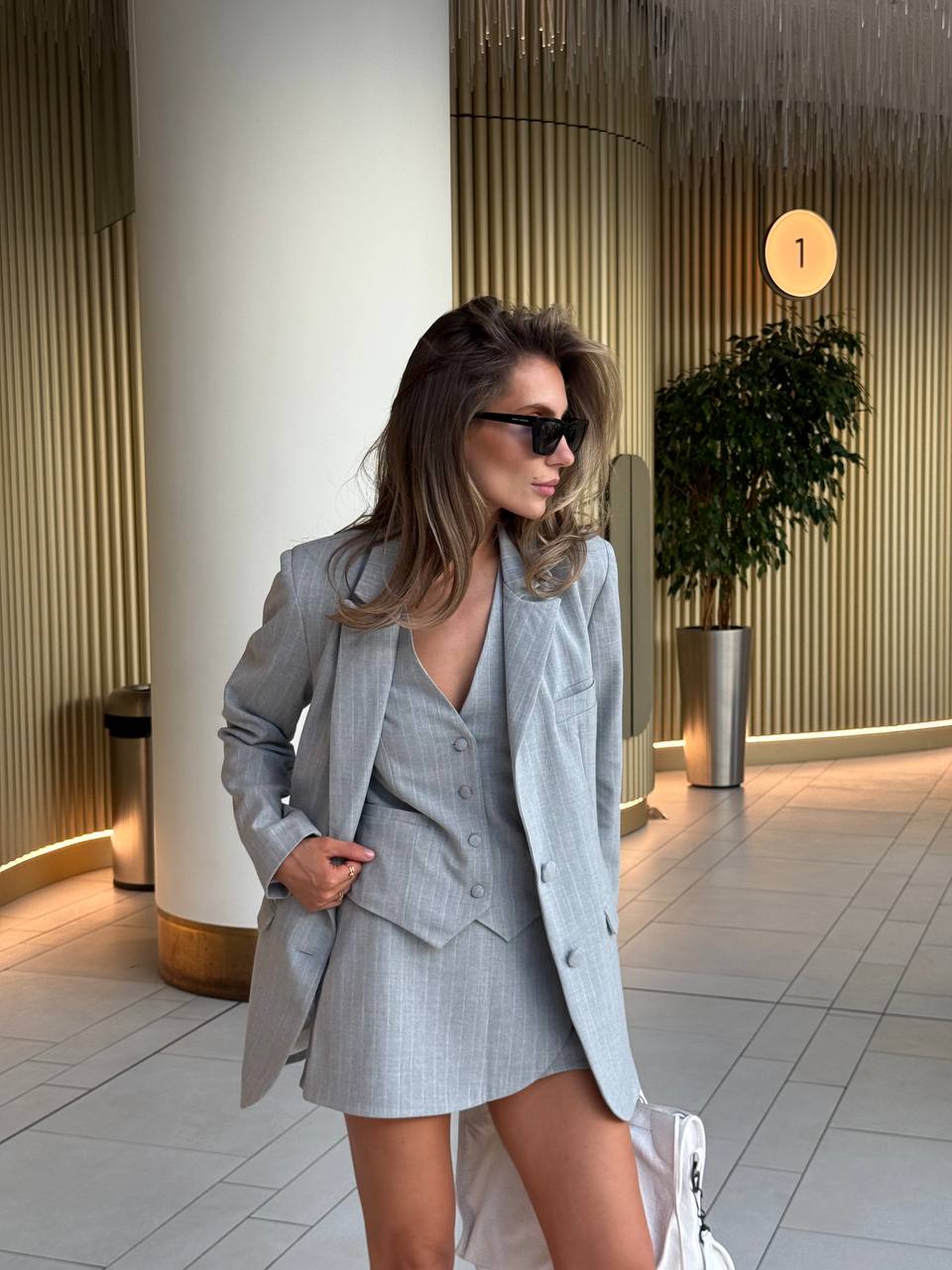 Three-piece suit (jacket, vest, skirt-shorts)