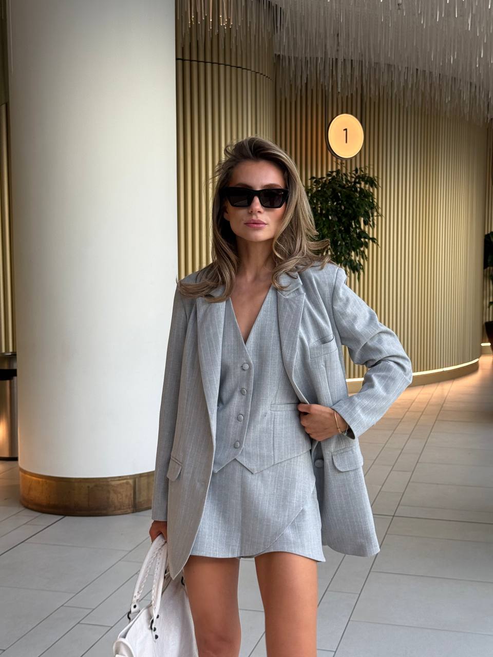 Three-piece suit (jacket, vest, skirt-shorts)