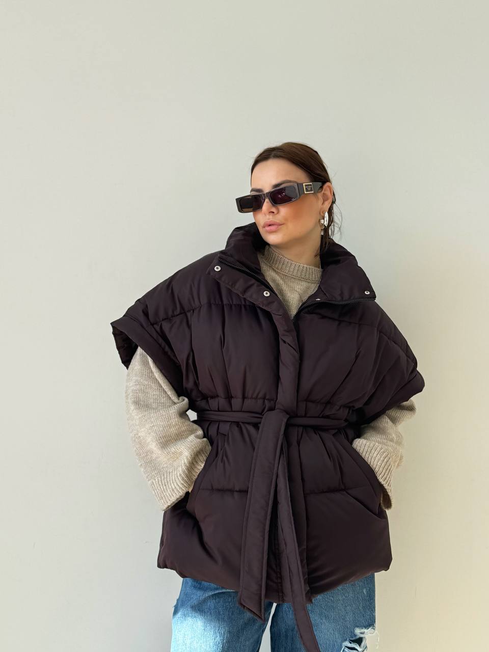 Oversized vest with a belt