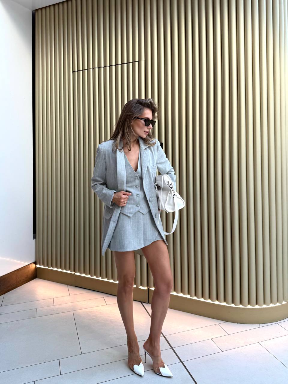 Three-piece suit (jacket, vest, skirt-shorts)
