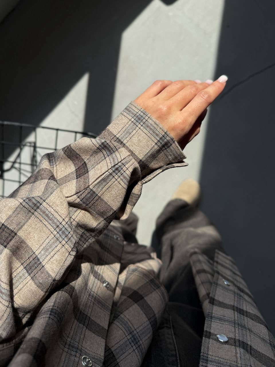 A bright checkered shirt with a matching scarf