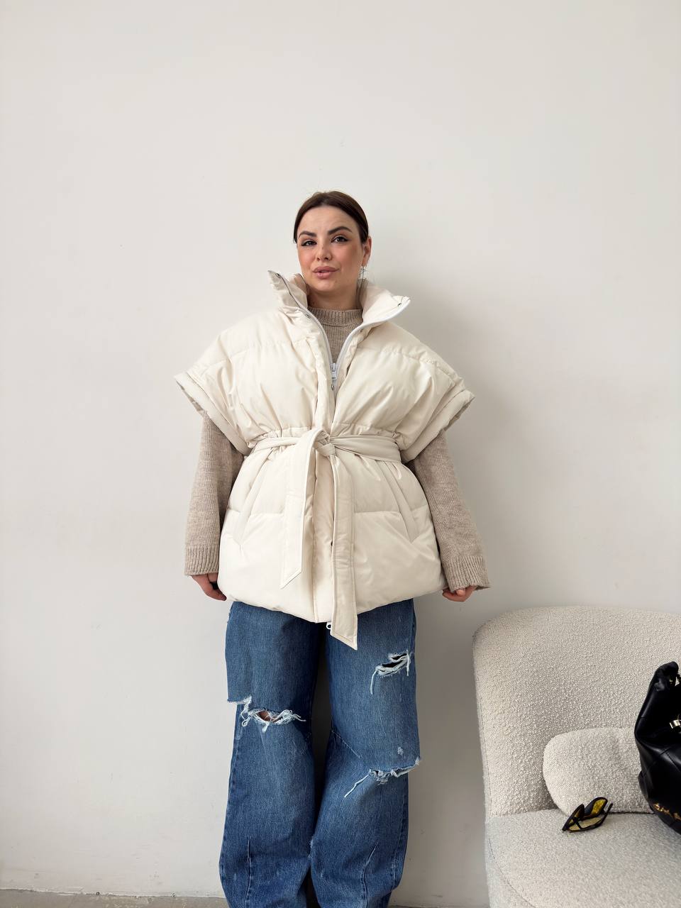 Oversized vest with a belt