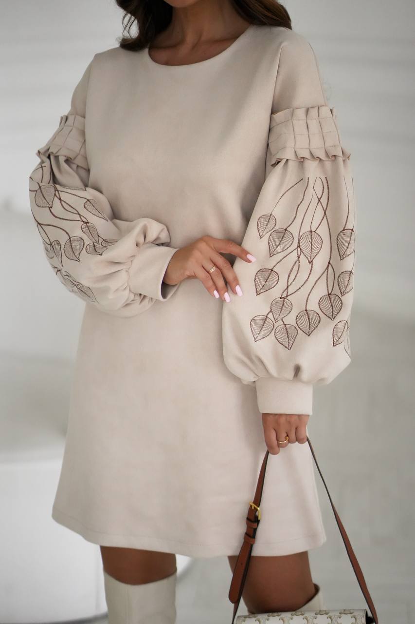 Suede dress with embroidery on the sleeves