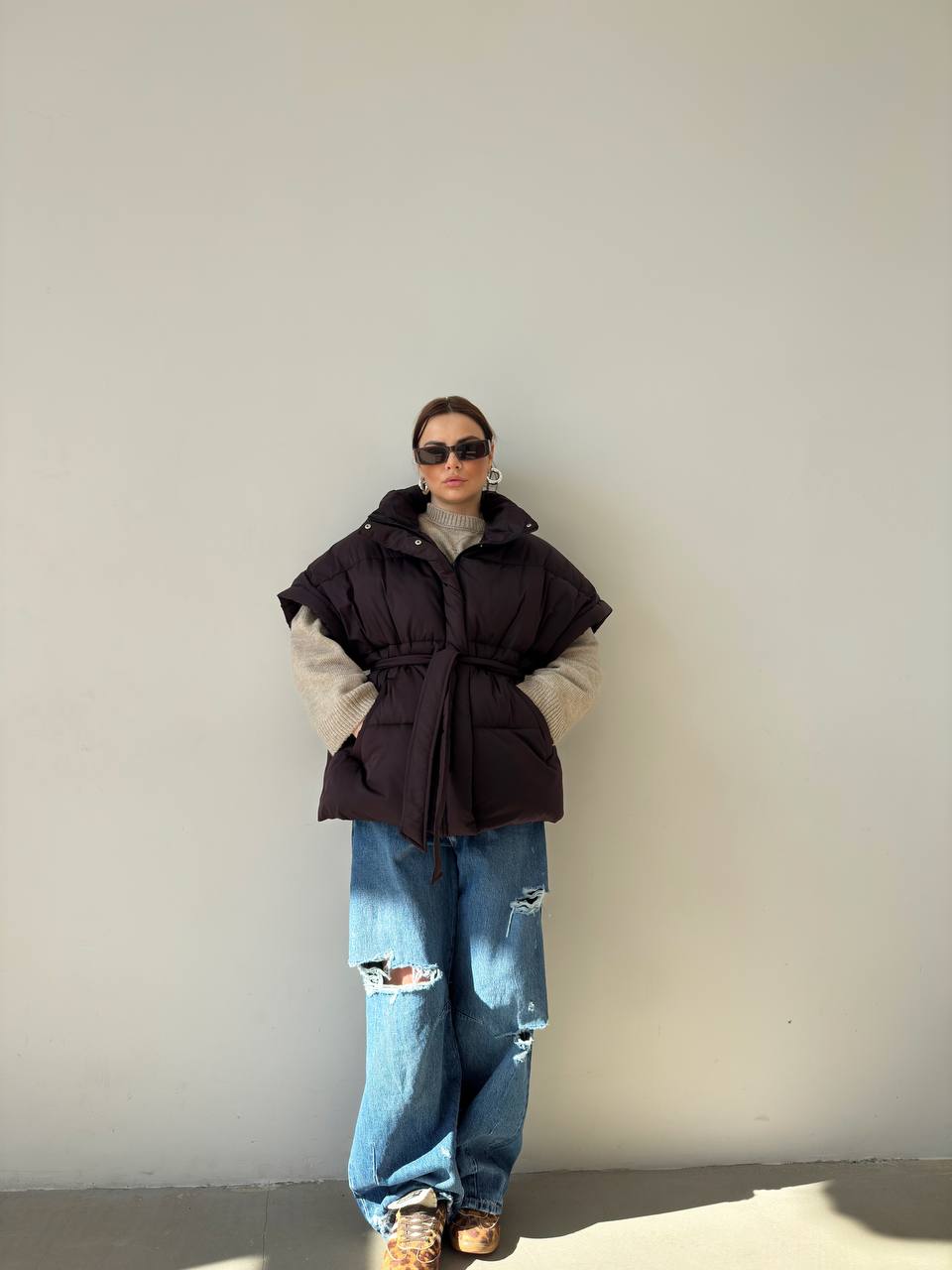 Oversized vest with a belt