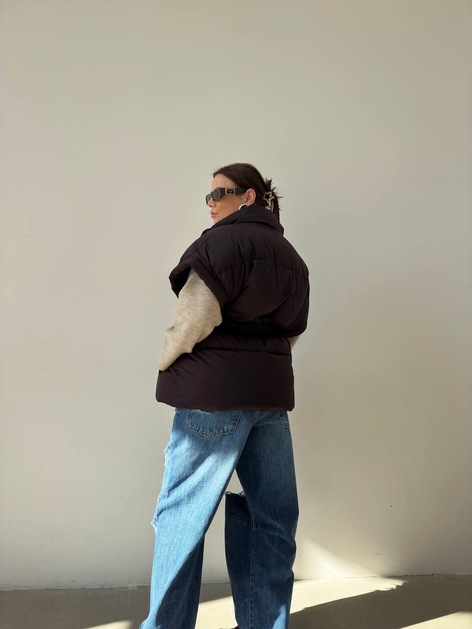 Oversized vest with a belt