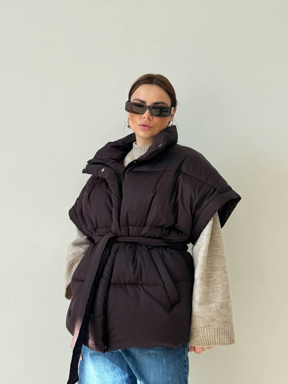 Oversized vest with a belt