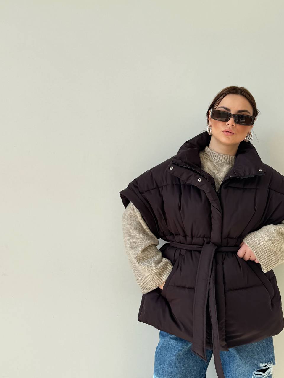 Oversized vest with a belt