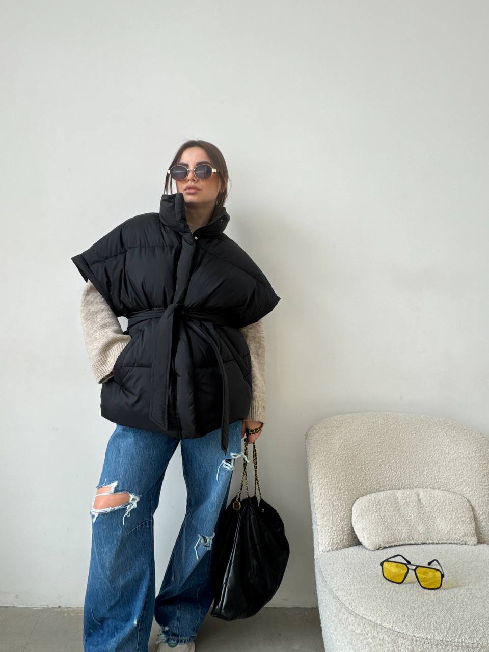 Oversized vest with a belt