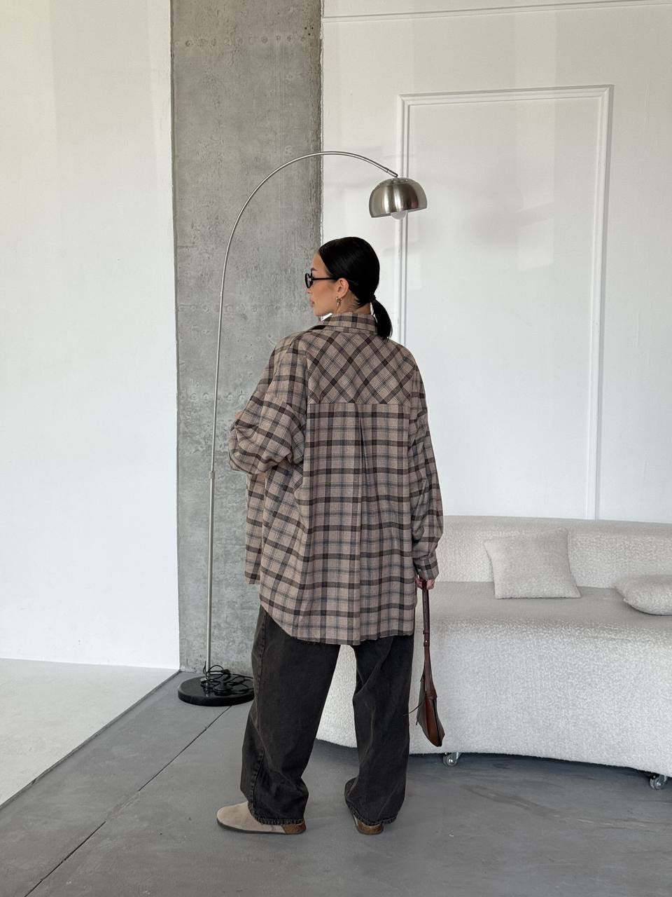 A bright checkered shirt with a matching scarf