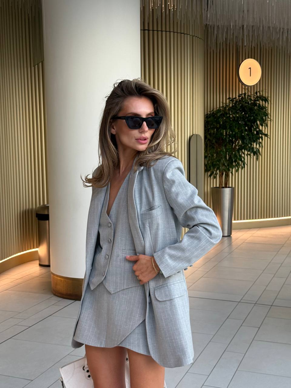 Three-piece suit (jacket, vest, skirt-shorts)