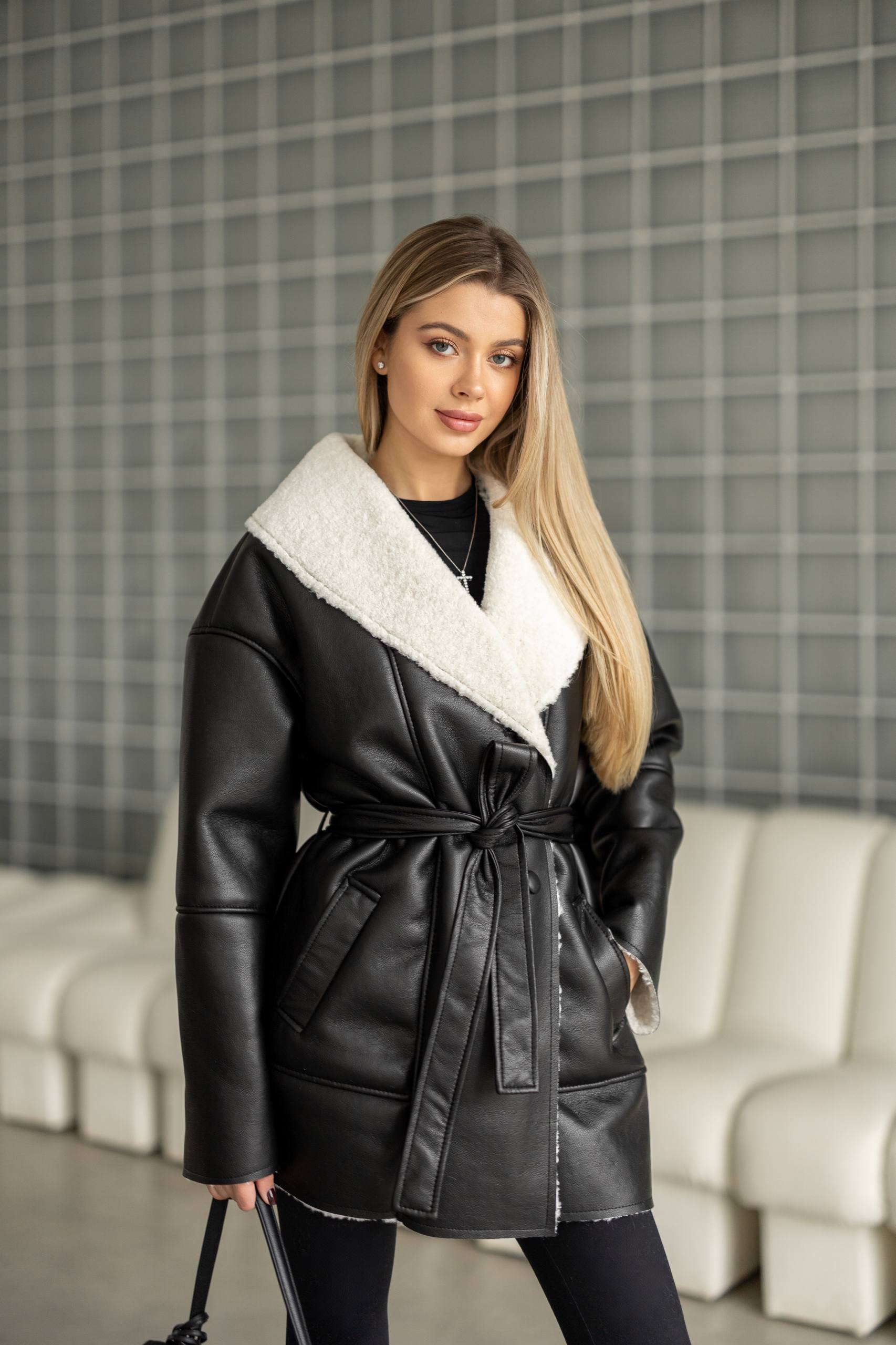 Elongated eco-leather shearling coat with teddy fur and a belt included